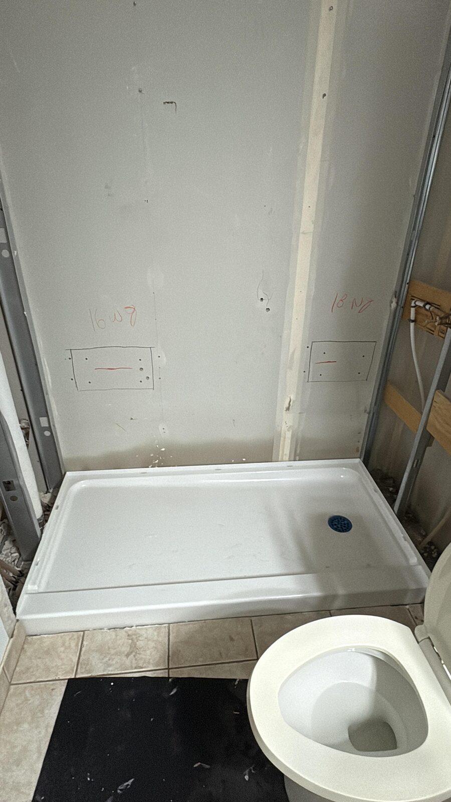 New shower base rough-in before tiling